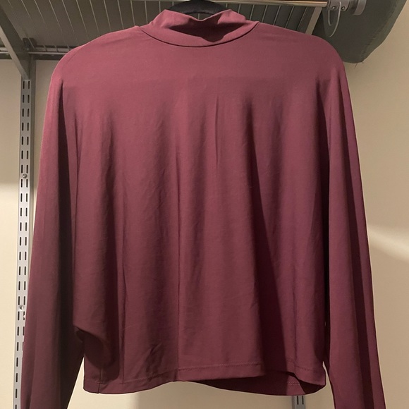 Mock neck dolman top with button sleeves - Picture 1 of 3